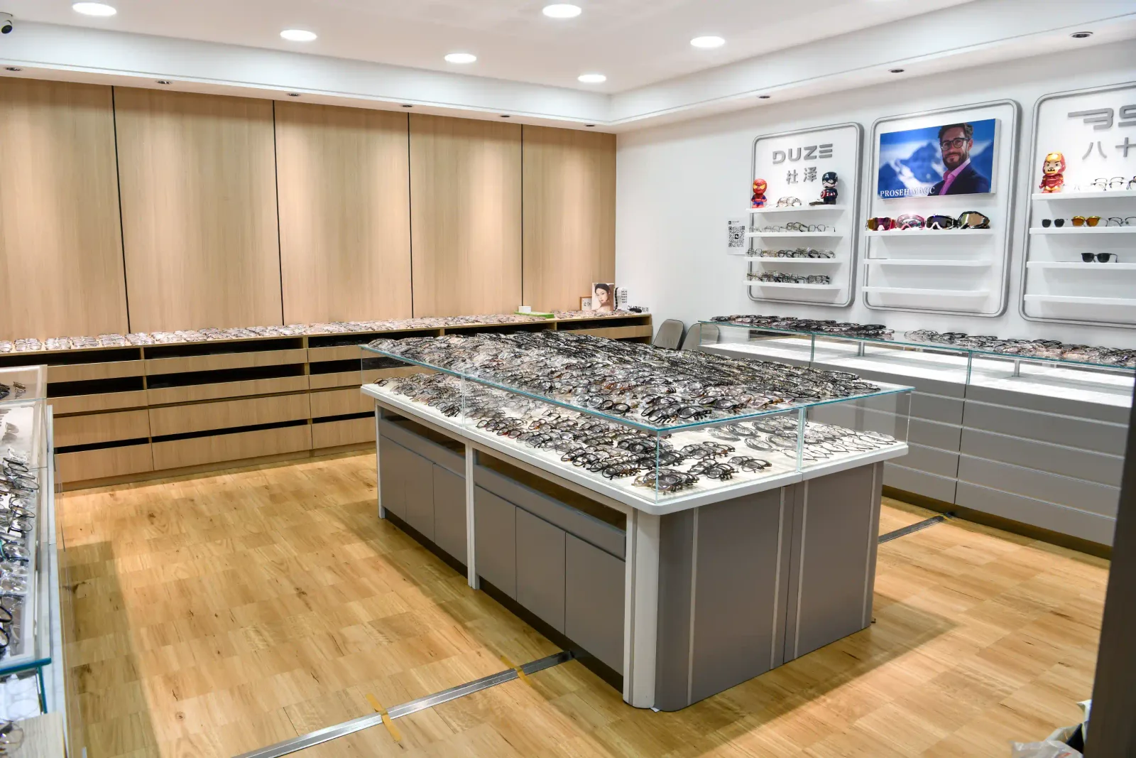 Central display island filled with sample eyewear frames in the HAO Eyewear showroom