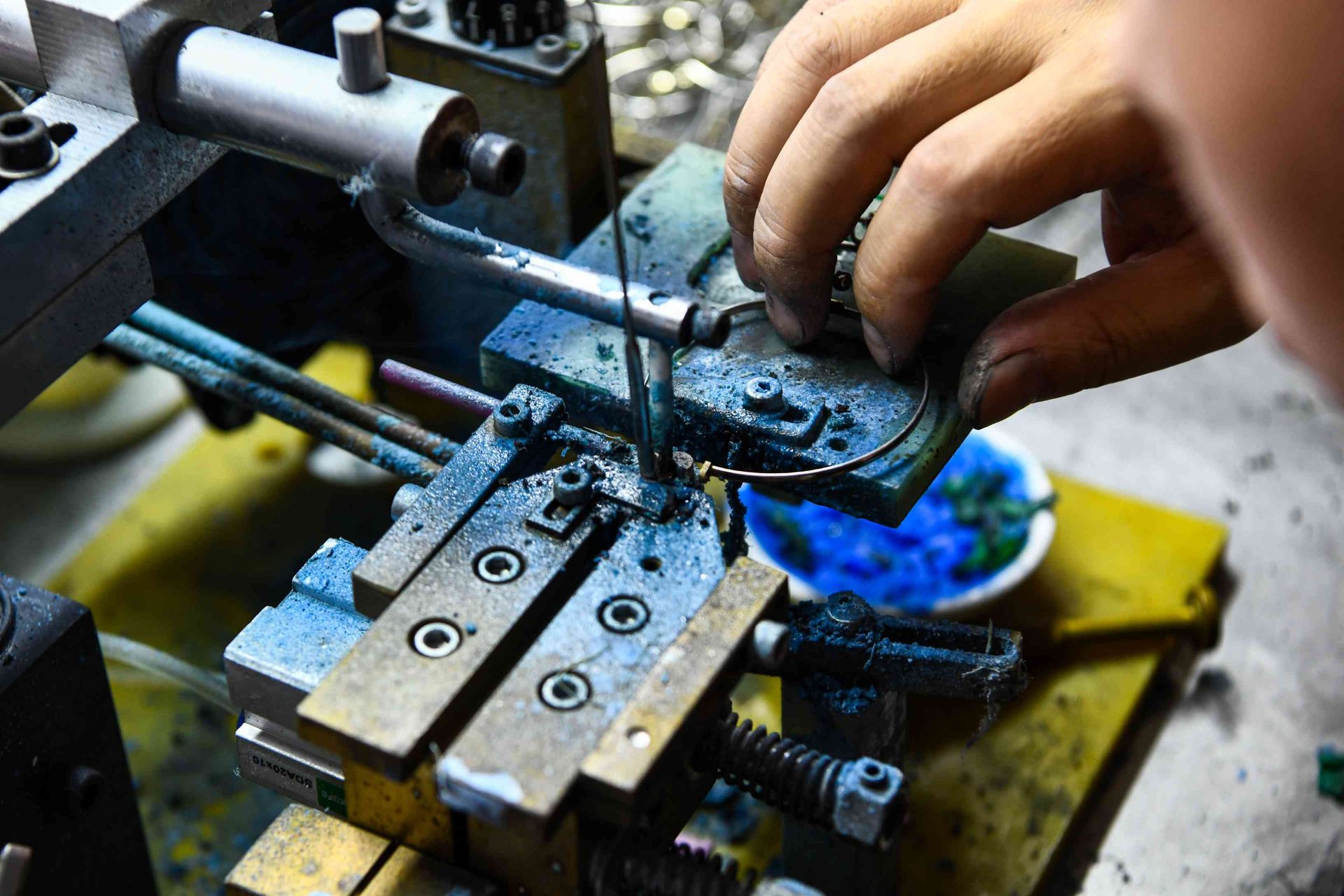 Close-up of precision spot welding for metal eyewear frame components — titanium frame manufacturing at HAO Eyewear